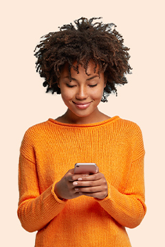 Woman reading news on mobile phone