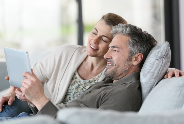 Older couple viewing tablet